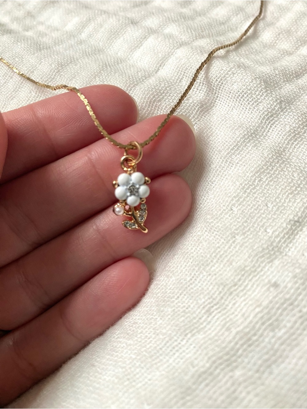 Gold Floral Pendant Necklace with White Enamel Flower